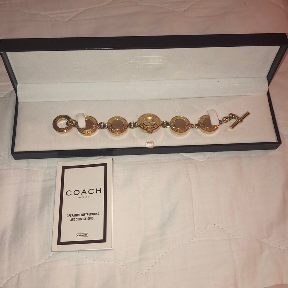 Beautiful gold coach watch !